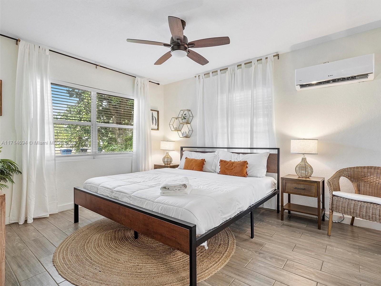 300 Southwest 23rd Street Fort Lauderdale, FL 33315 - Photo 26 of 43 a living room with furniture and a large window