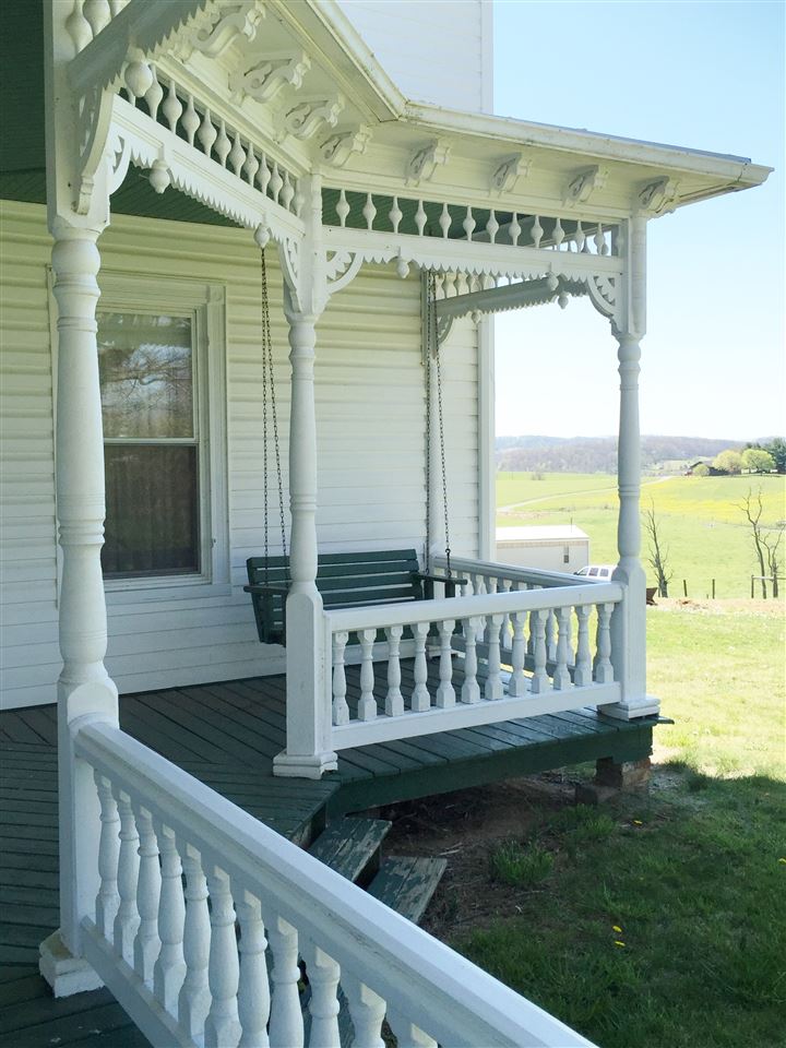 1738 Middlebrook Road Staunton, VA 24401 - Photo 6 of 50 a view of a porch with a floor to ceiling window yard and outdoor view