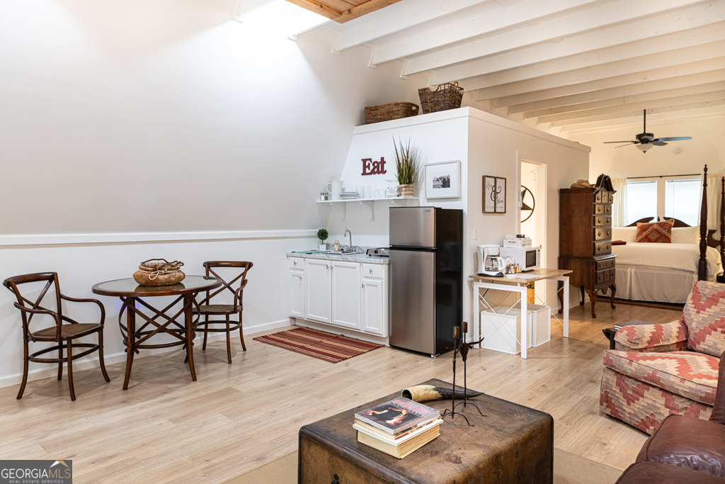 67 Big Tree Road Suches, GA 30572 - Photo 20 of 27 a living room with furniture a dining table and chairs