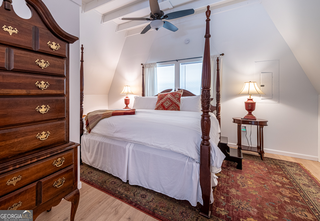 67 Big Tree Road Suches, GA 30572 - Photo 24 of 27 a bedroom with a bed and a dresser