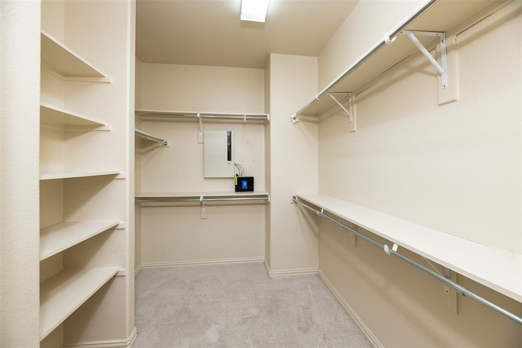 7914 Bishop Road Plano, TX 75024 - Photo 20 of 33 a walk in closet with view of walk in closet
