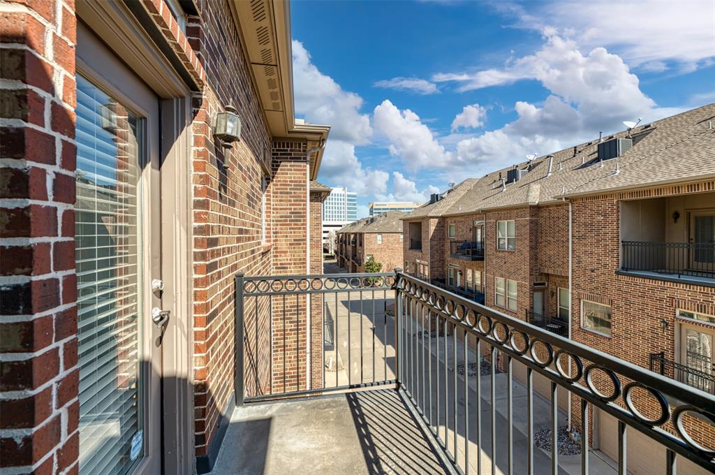 7914 Bishop Road Plano, TX 75024 - Photo 21 of 33 a view of a balcony with wooden floor and fence