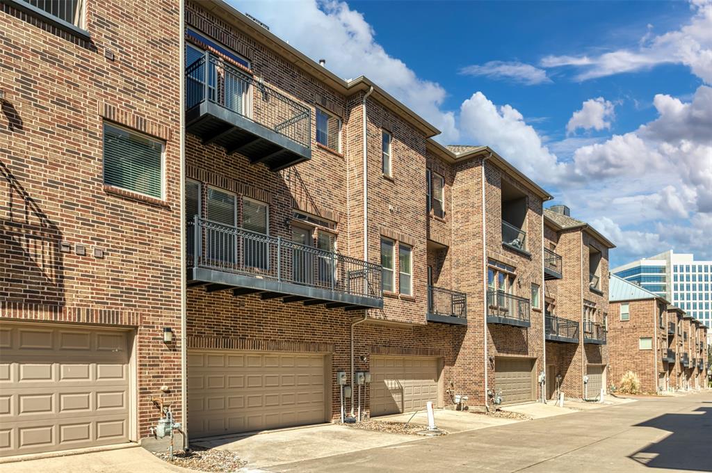 7914 Bishop Road Plano, TX 75024 - Photo 27 of 33 a view of a brick building with many windows