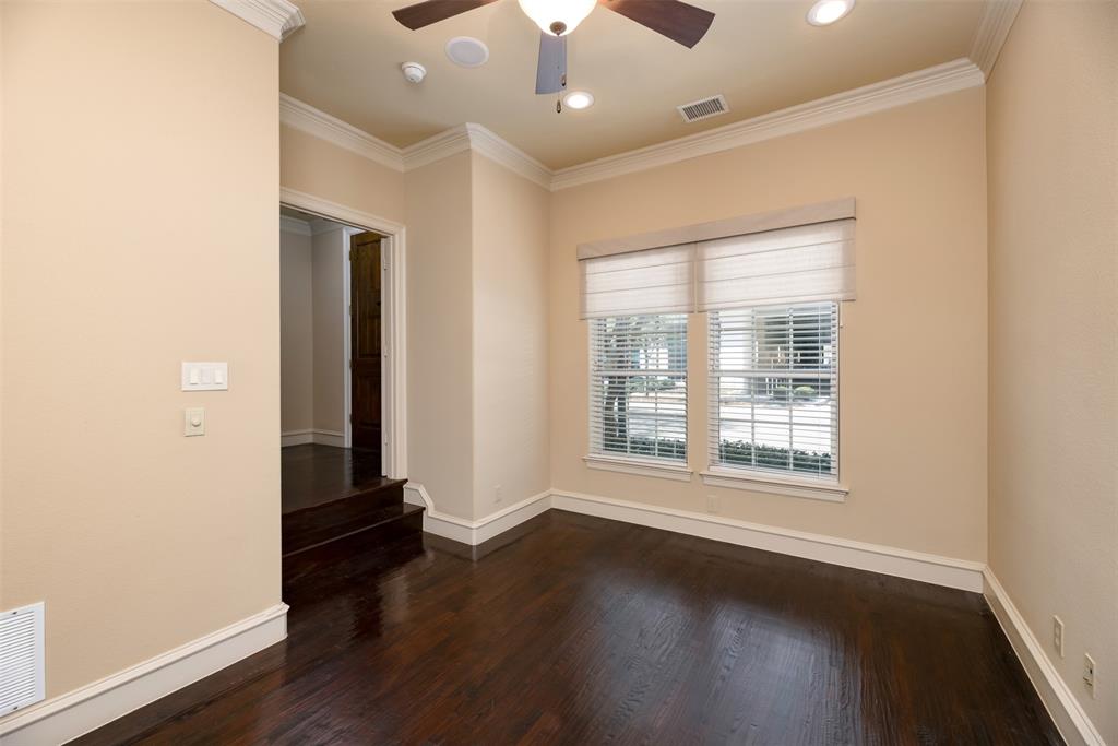 7914 Bishop Road Plano, TX 75024 - Photo 5 of 33 a view of an empty room with wooden floor and a window