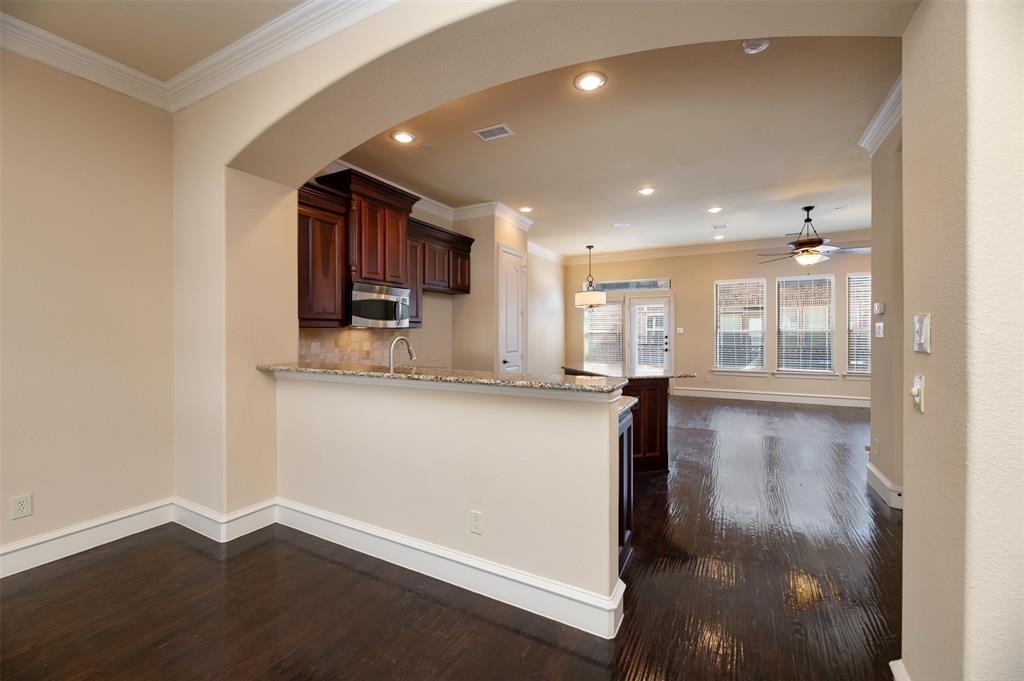 7914 Bishop Road Plano, TX 75024 - Photo 8 of 33 a view of kitchen with wooden floor and window