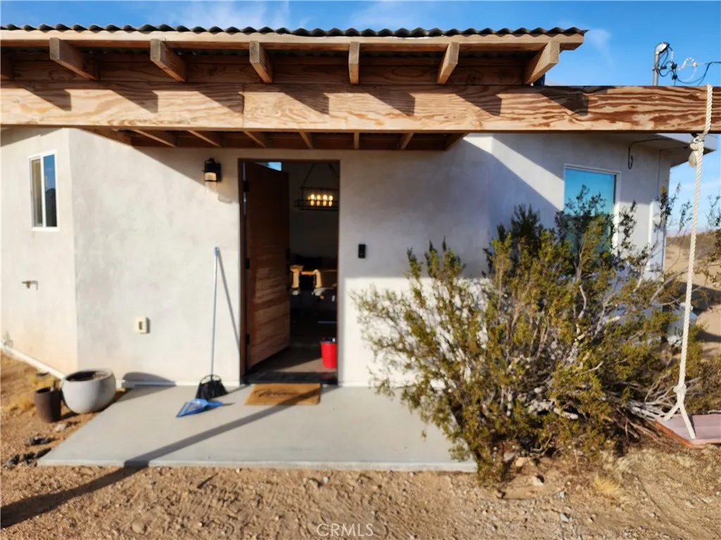 0 Patrick Joshua Tree, CA 92252 - Photo 3 of 15 a view of a house with a patio