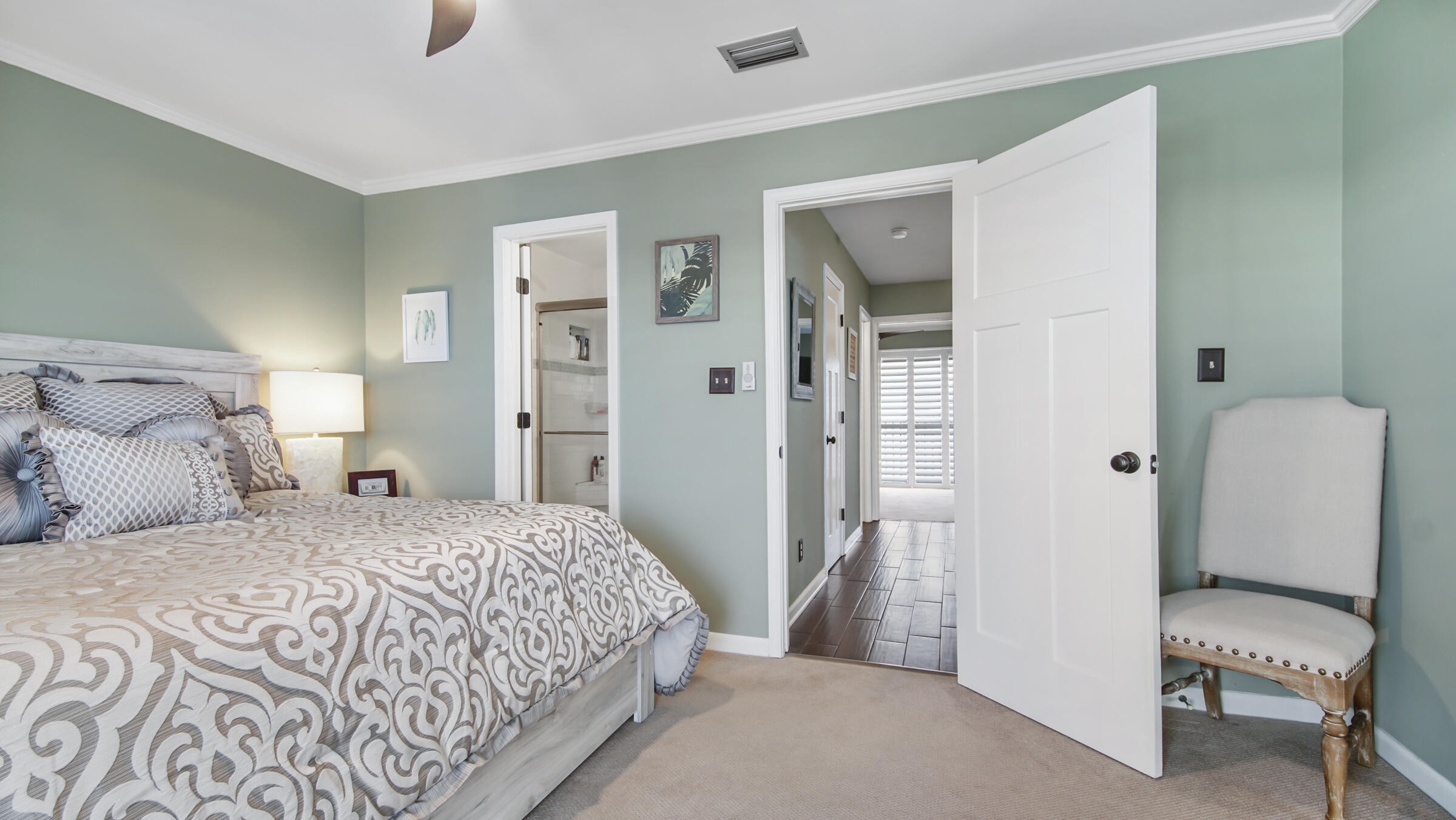 11 Driftwood Road, Unit 22 Miramar Beach, FL 32550 - Photo 14 of 29 a bedroom with a bed and a chair