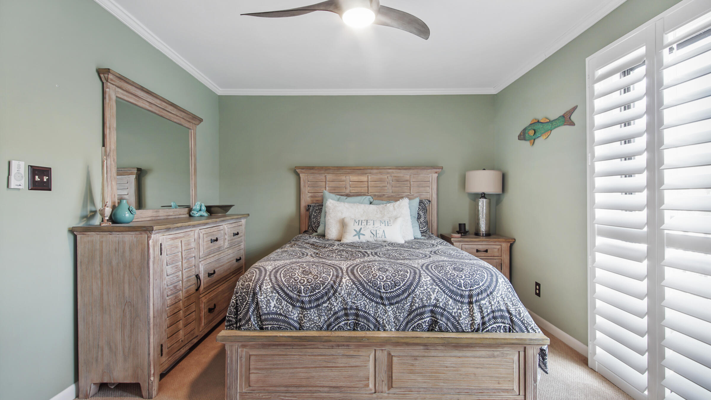 11 Driftwood Road, Unit 22 Miramar Beach, FL 32550 - Photo 20 of 29 a bedroom with a bed and a mirror on dresser