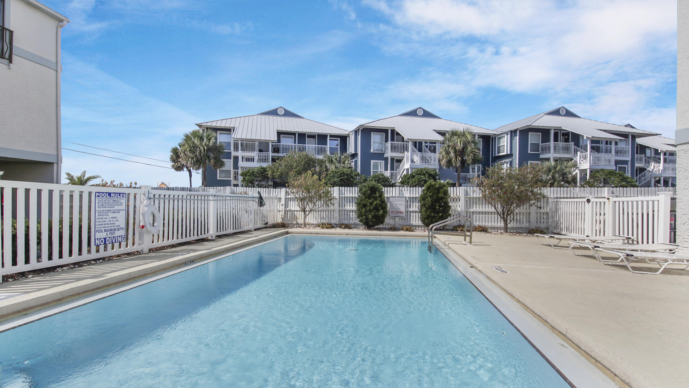 11 Driftwood Road, Unit 22 Miramar Beach, FL 32550 - Photo 23 of 29 a view of a house with a swimming pool