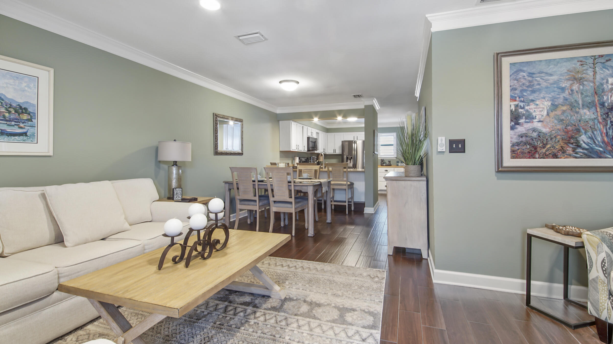 11 Driftwood Road, Unit 22 Miramar Beach, FL 32550 - Photo 10 of 29 a living room with furniture and wooden floor