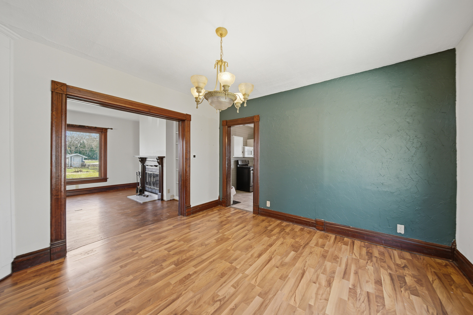 304 West Chamberlin Street Dixon, IL 61021 - Photo 15 of 28 a view of a livingroom with a chandelier