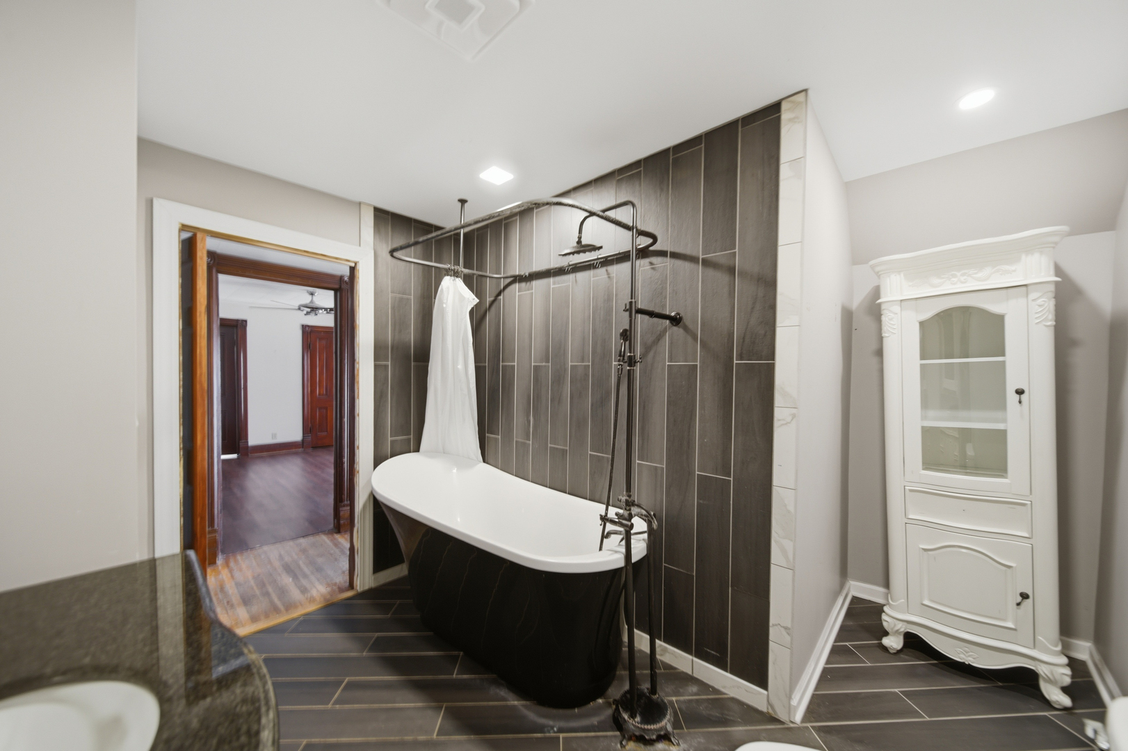 304 West Chamberlin Street Dixon, IL 61021 - Photo 21 of 28 a bathroom with a sink and mirror