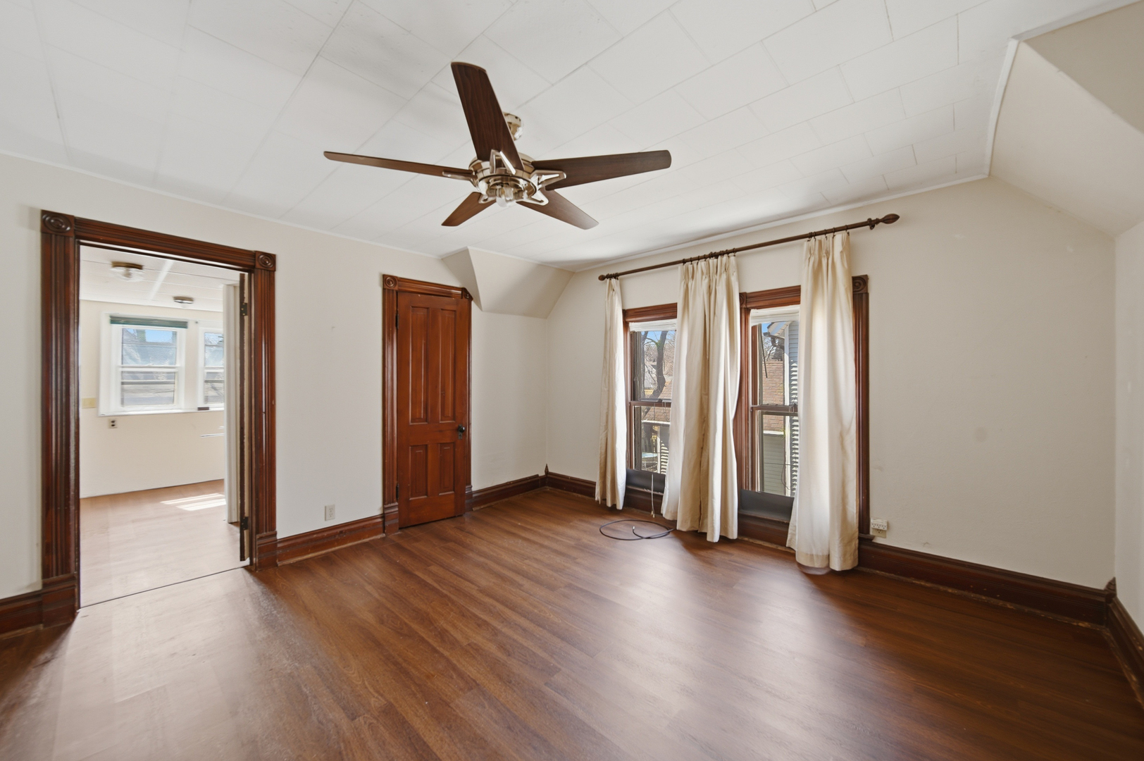 304 West Chamberlin Street Dixon, IL 61021 - Photo 22 of 28 a view of empty room with wooden floor and window