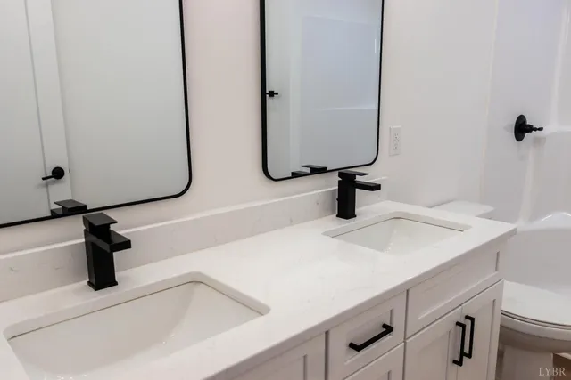 a bathroom with a shower and toilet