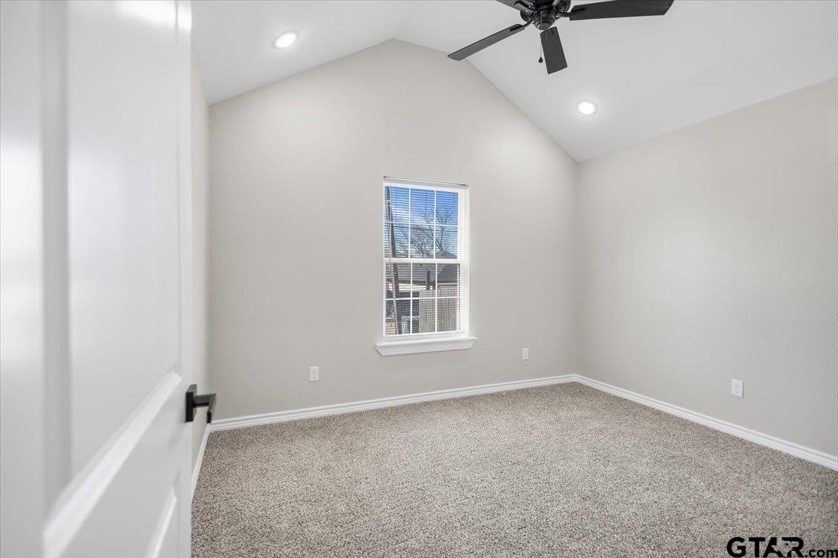 1607 North Ross Avenue Tyler, TX 75702 - Photo 13 of 39 an empty room with a window