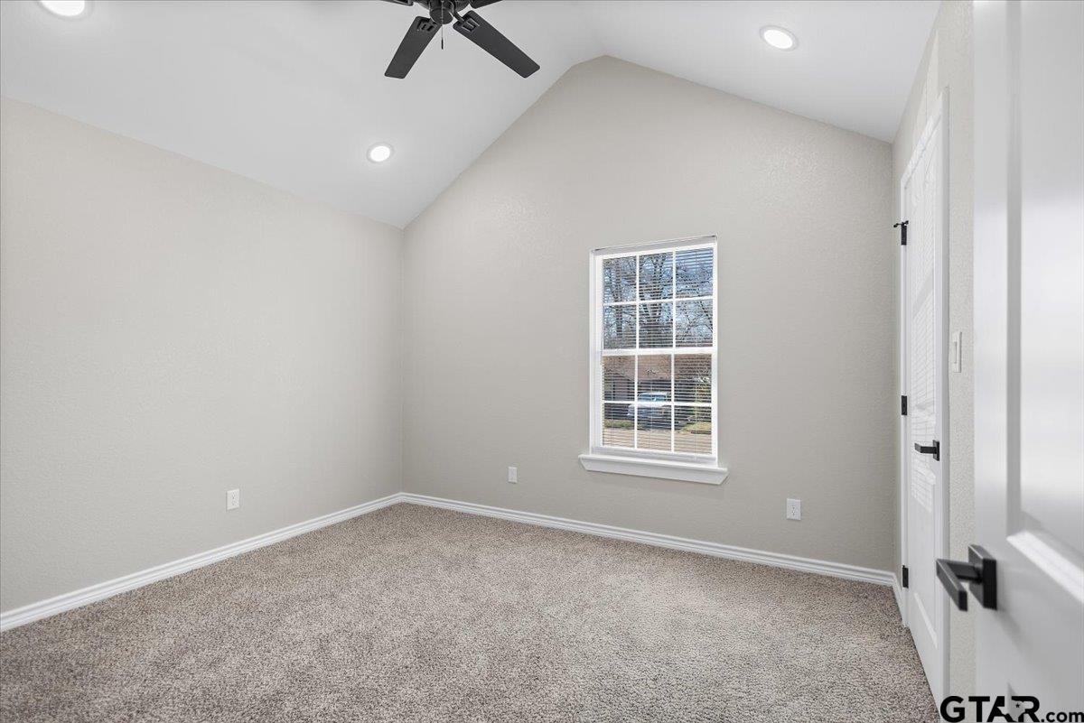 1607 North Ross Avenue Tyler, TX 75702 - Photo 20 of 39 an empty room with a window
