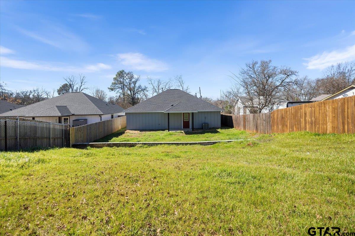 1607 North Ross Avenue Tyler, TX 75702 - Photo 29 of 39 a house view with a garden space