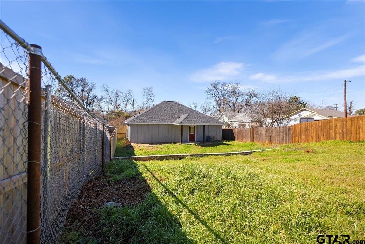 1607 North Ross Avenue Tyler, TX 75702 - Photo 31 of 39 a house view with a outdoor space