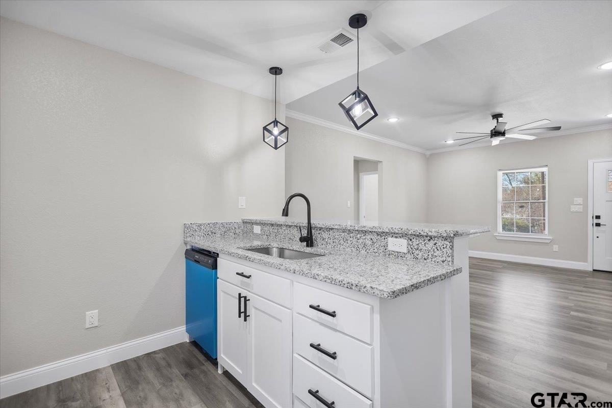 1607 North Ross Avenue Tyler, TX 75702 - Photo 10 of 39 a view of center island in the kitchen