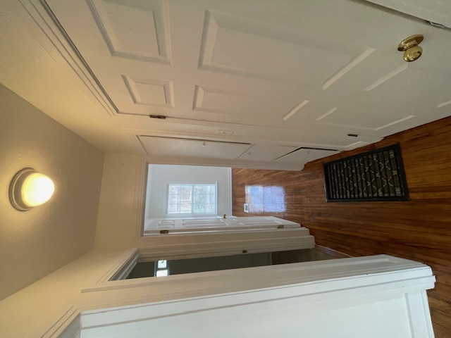 2104 Enfield Road, Unit B Austin, TX 78703 - Photo 15 of 15 a bathroom with sink a shower a toilet and a window