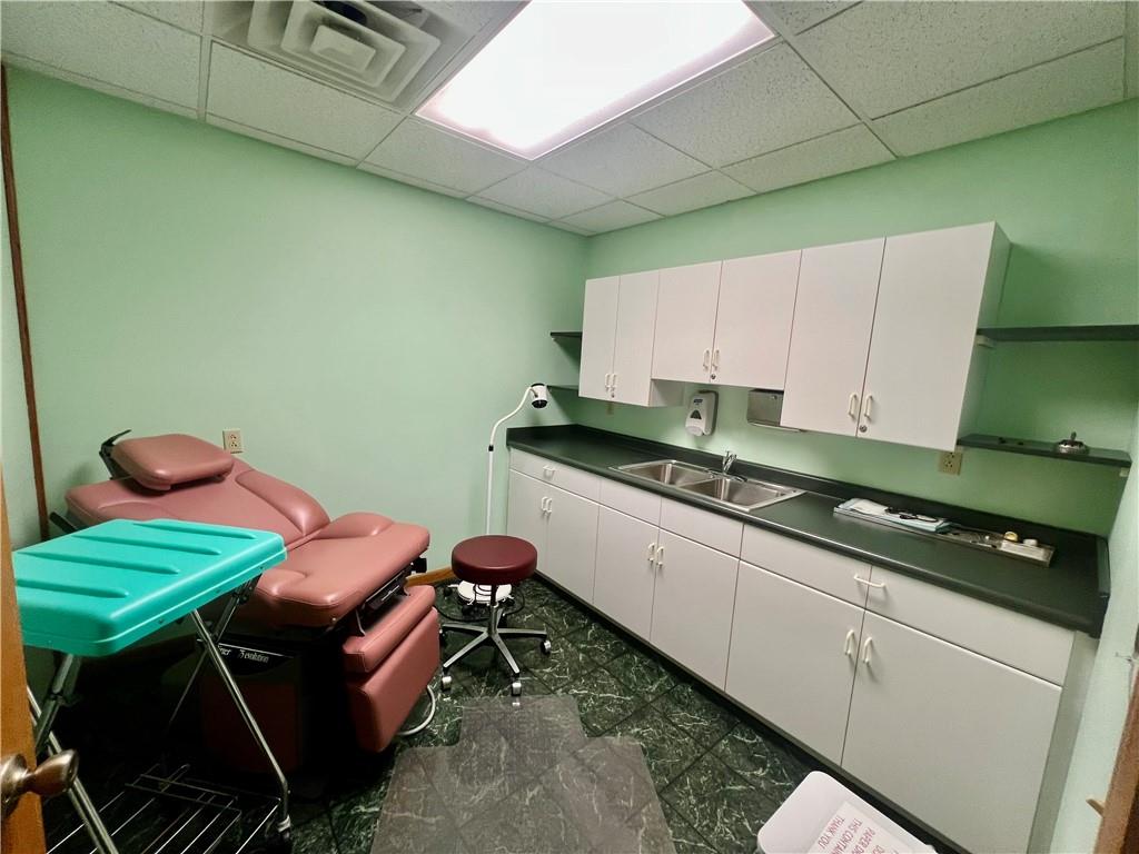 3121 Wilmington Road, Unit 3 New Castle, PA 16105 - Photo 11 of 21 a kitchen with a sink and a stove top oven