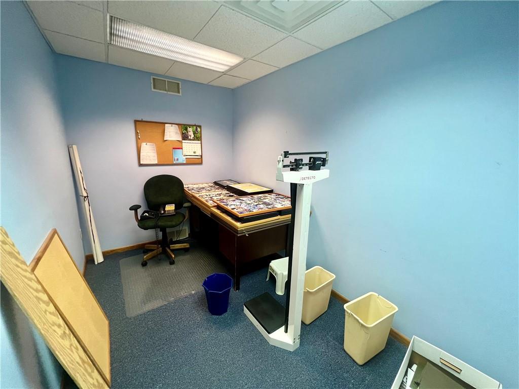3121 Wilmington Road, Unit 3 New Castle, PA 16105 - Photo 13 of 21 a view of a workspace with furniture and a window