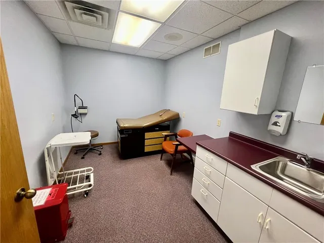 a room with furniture and a chandelier