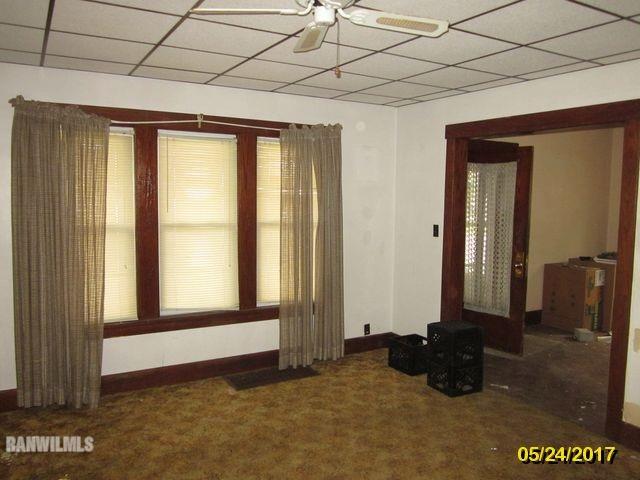 415 Bowen Street Savanna, IL 61074 - Photo 17 of 19 a view of a room with large windows