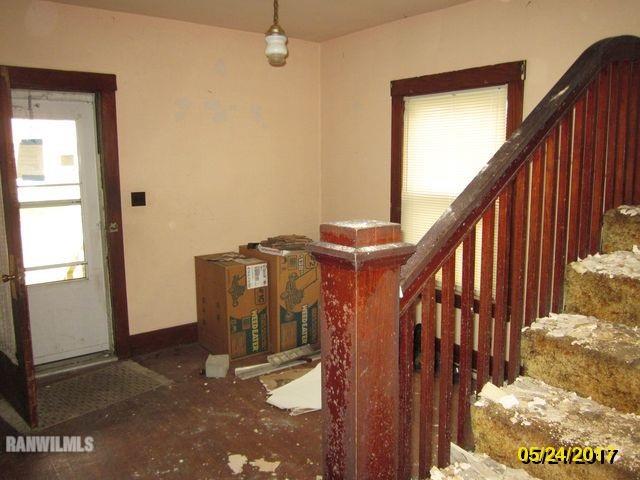 415 Bowen Street Savanna, IL 61074 - Photo 5 of 19 a view of entryway with wooden floor
