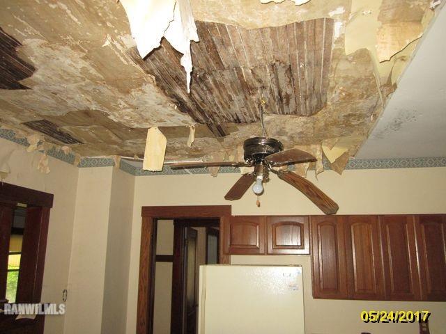 415 Bowen Street Savanna, IL 61074 - Photo 9 of 19 a view of a chairs and table in the balcony