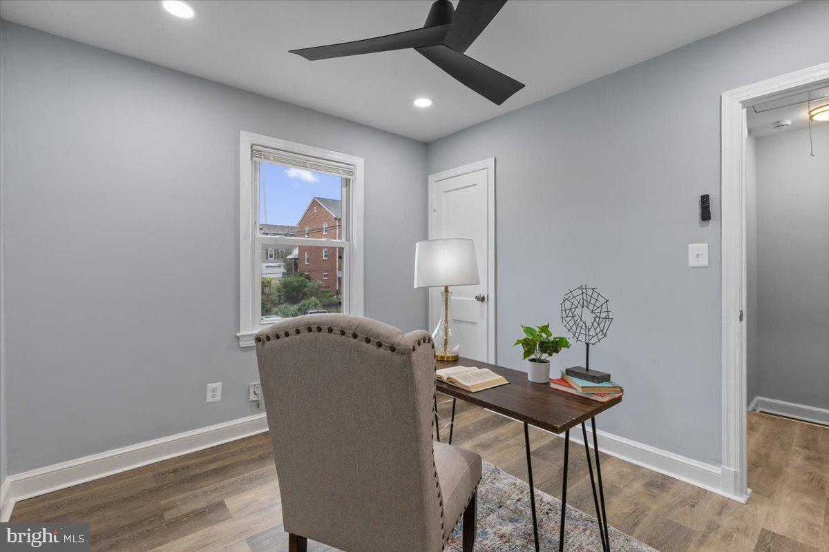 2202 U Place Southeast Washington, DC 20020 - Photo 12 of 21 a room with furniture and a potted plant