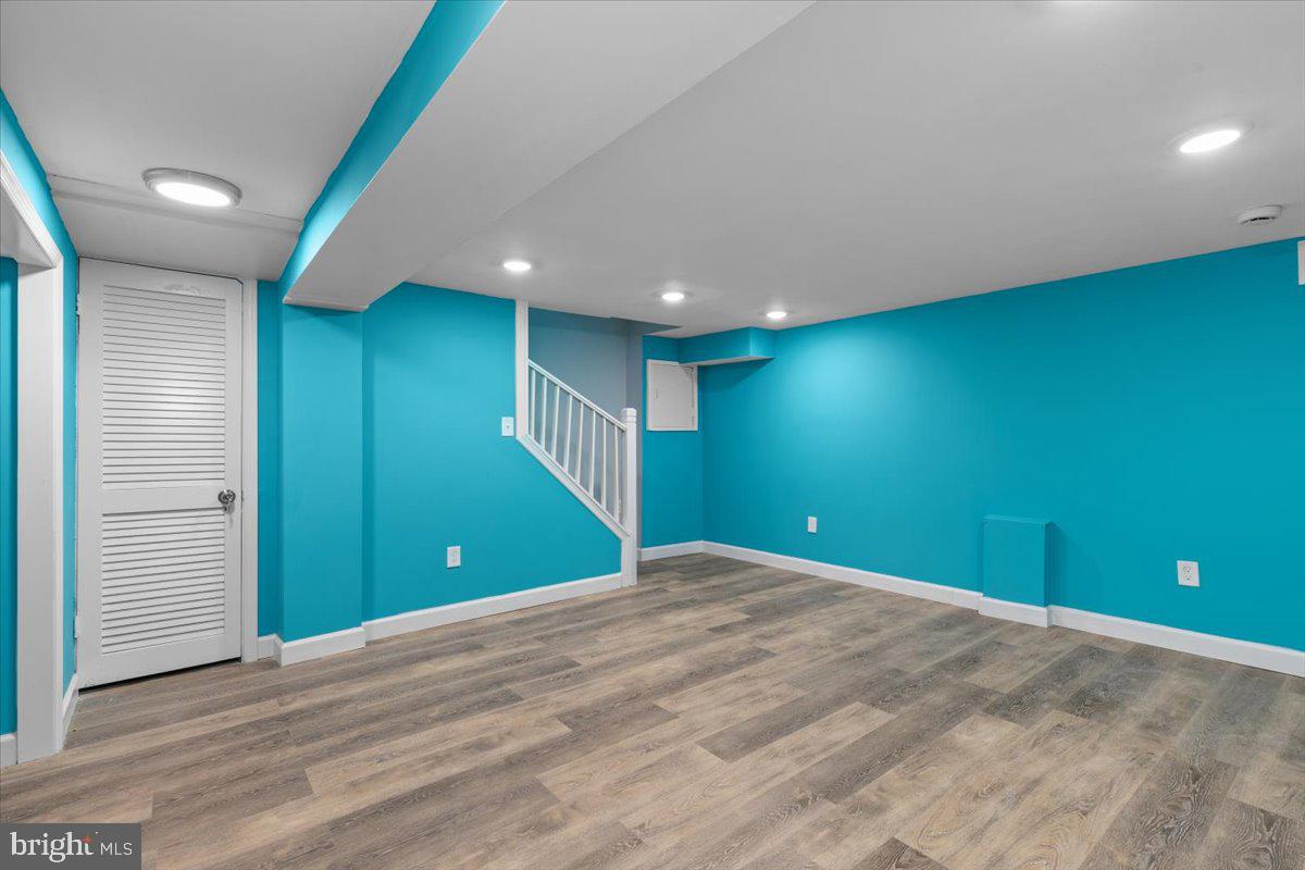 2202 U Place Southeast Washington, DC 20020 - Photo 16 of 21 a view of empty room with a window and stairs