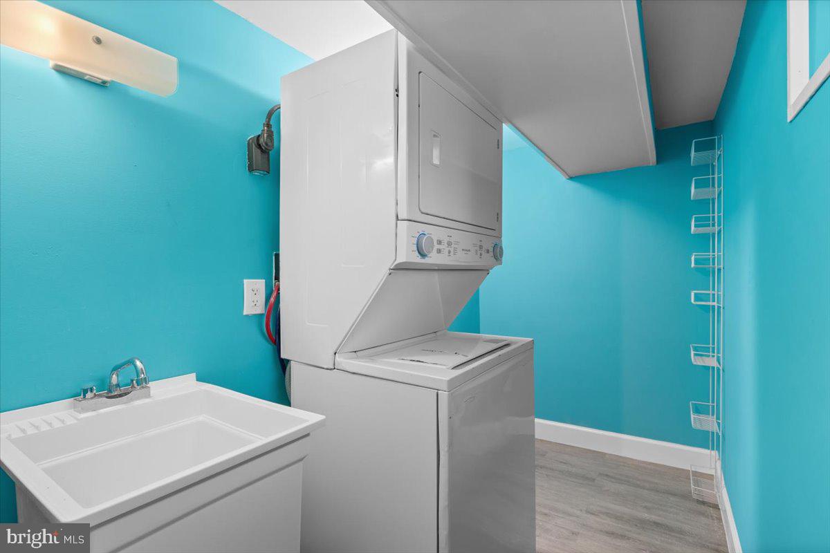 2202 U Place Southeast Washington, DC 20020 - Photo 19 of 21 a bathroom with a sink and a washer dryer
