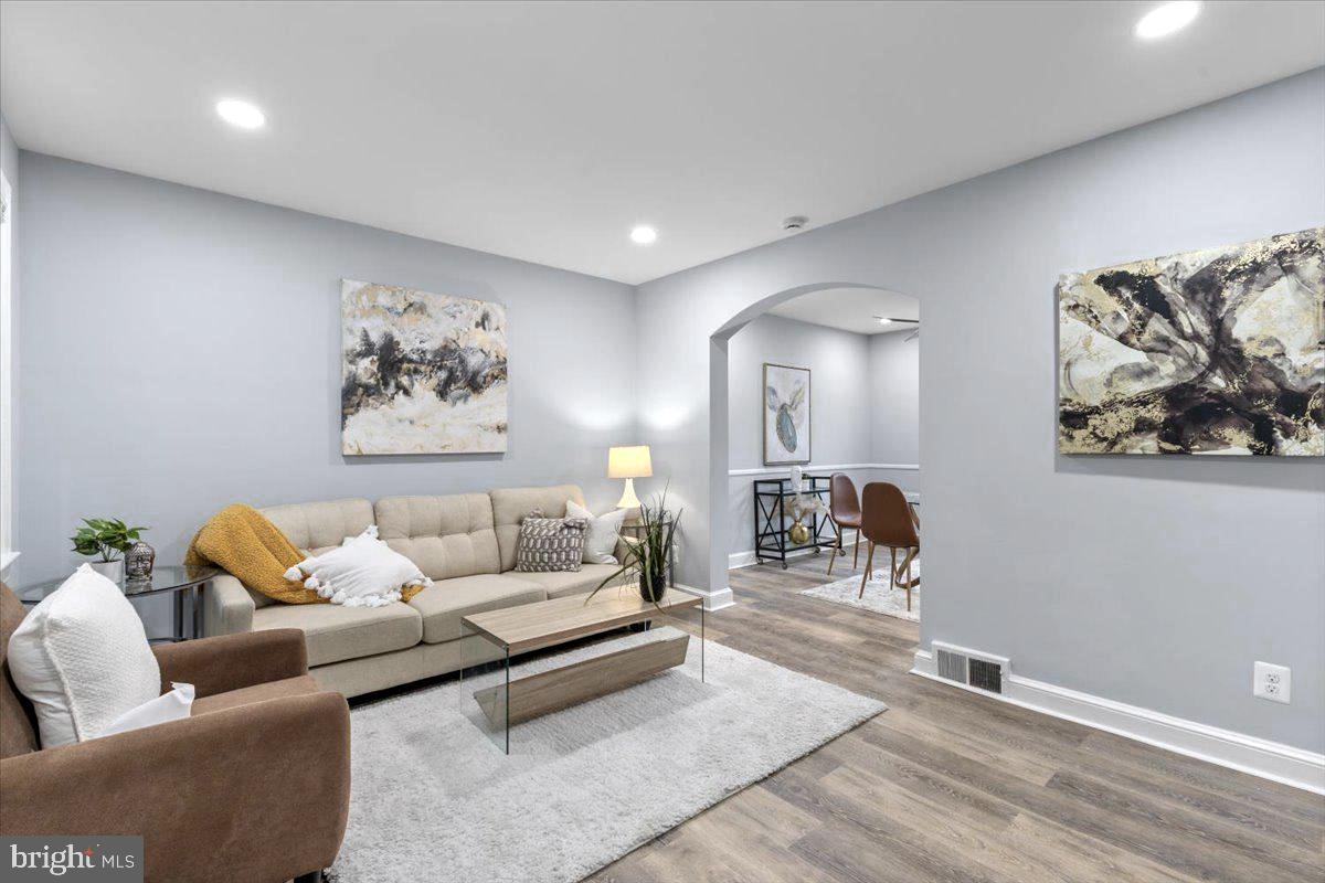 2202 U Place Southeast Washington, DC 20020 - Photo 2 of 21 a living room with furniture and wooden floor