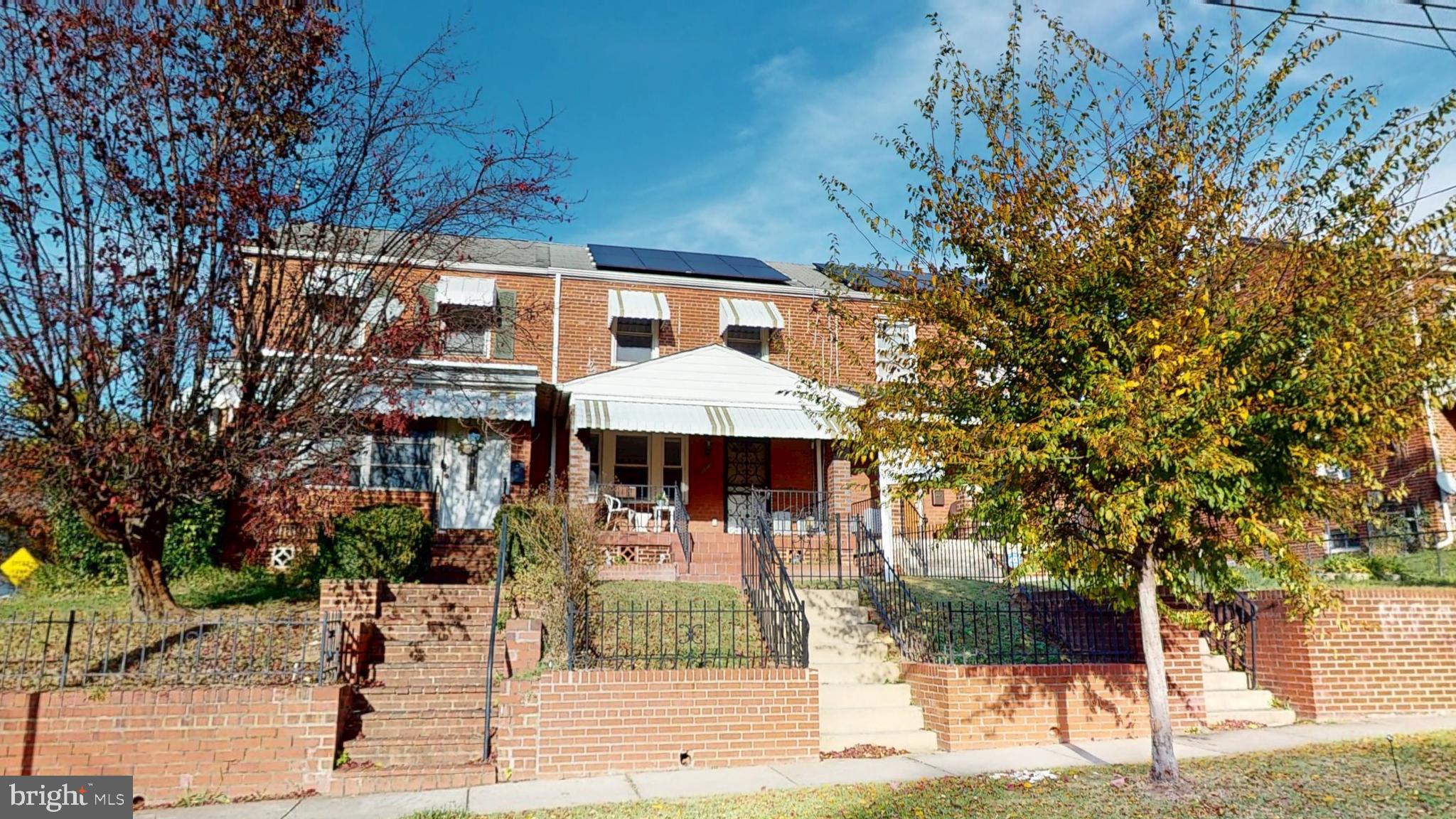 2202 U Place Southeast Washington, DC 20020 - Photo 3 of 21 a front view of a house with a tree
