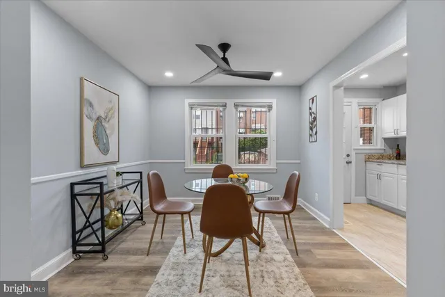 a kitchen with stainless steel appliances granite countertop a stove microwave and sink