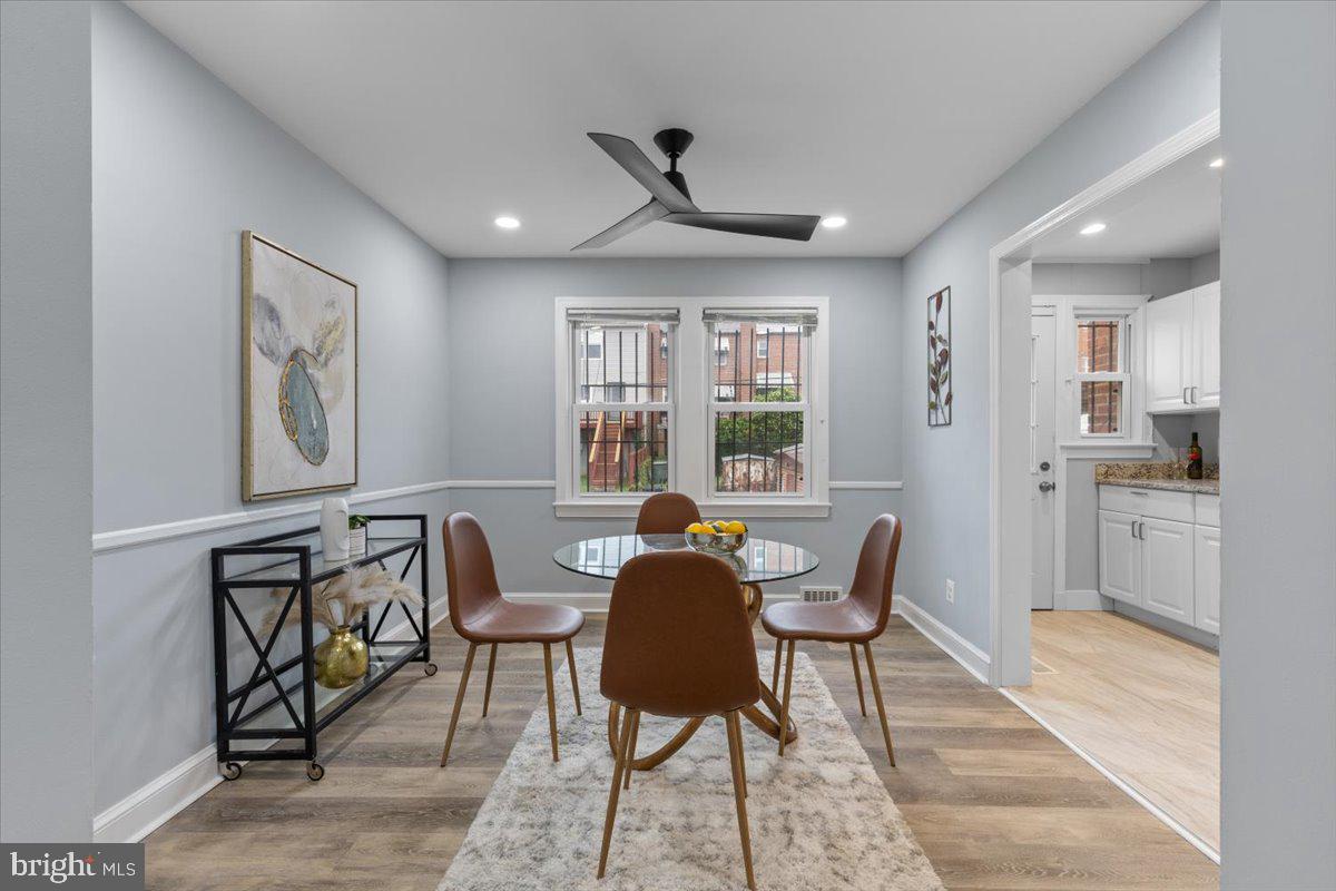 2202 U Place Southeast Washington, DC 20020 - Photo 8 of 21 a living room with furniture and a large window