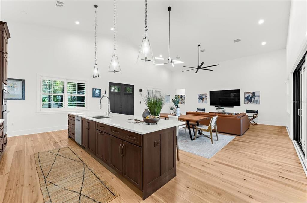 1044 Riverside Ridge Road Tarpon Springs, FL 34688 - Photo 17 of 77 a kitchen with stainless steel appliances kitchen island a large island in the center