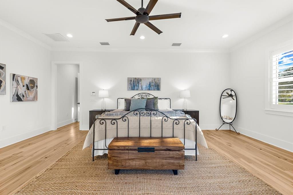 1044 Riverside Ridge Road Tarpon Springs, FL 34688 - Photo 28 of 77 a living room with furniture a window and a chandelier