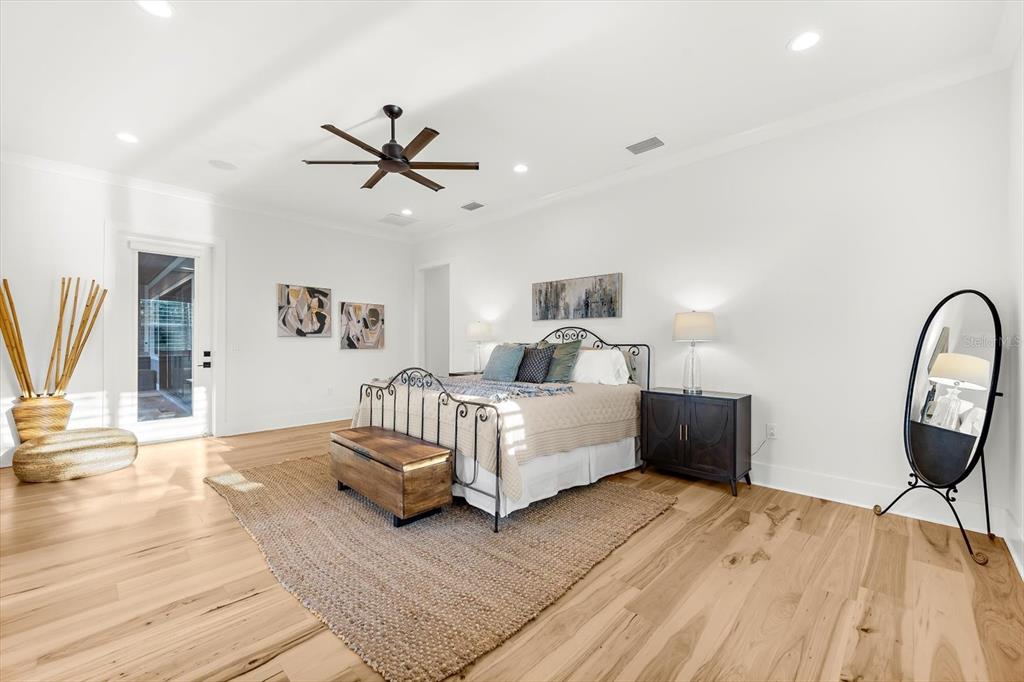 1044 Riverside Ridge Road Tarpon Springs, FL 34688 - Photo 29 of 77 a living room with furniture a ceiling fan a rug and a window