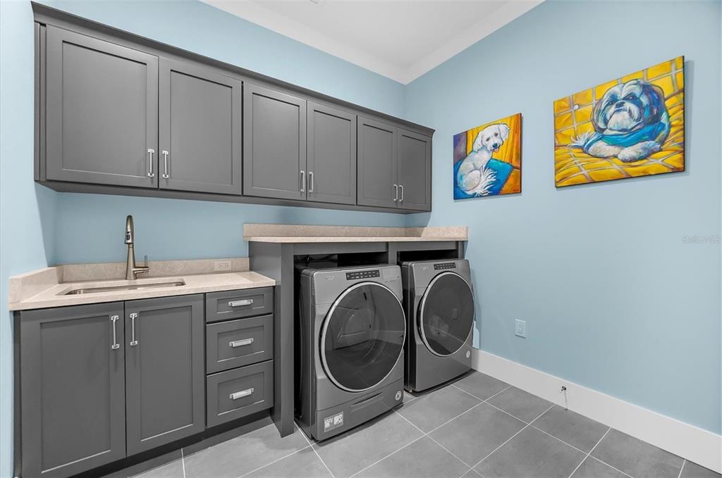 1044 Riverside Ridge Road Tarpon Springs, FL 34688 - Photo 45 of 77 a utility room with dryer and washer