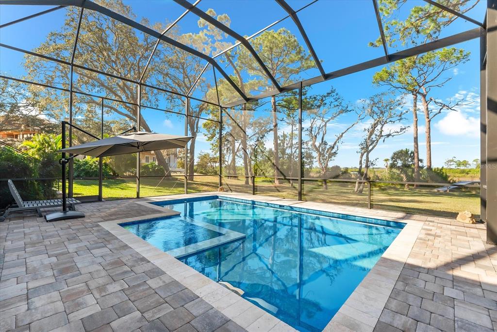 1044 Riverside Ridge Road Tarpon Springs, FL 34688 - Photo 50 of 77 a view of swimming pool with outdoor seating
