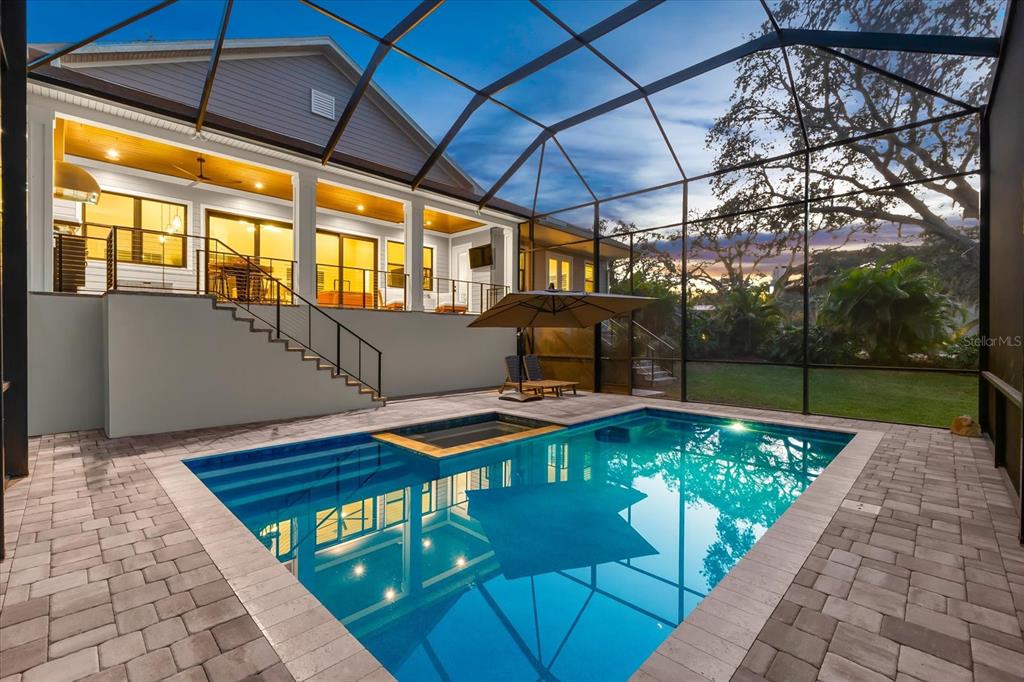 1044 Riverside Ridge Road Tarpon Springs, FL 34688 - Photo 67 of 77 a view of swimming pool with a patio