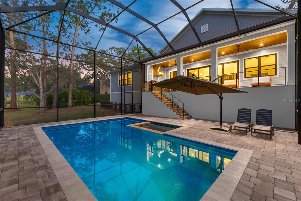 1044 Riverside Ridge Road Tarpon Springs, FL 34688 - Photo 68 of 77 a view of swimming pool with seating area