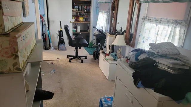 a view of gym equipment and windows