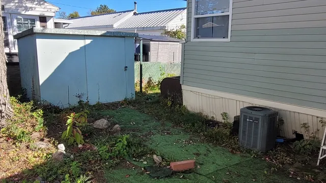 a view of a back yard of the house