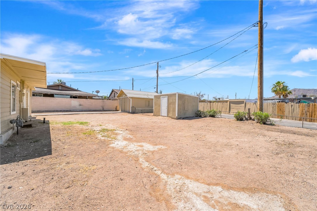 2 California Way Henderson, NV 89015 - Photo 29 of 29 A spacious desert backyard offers ample room for outdoor activities and future enhancements.