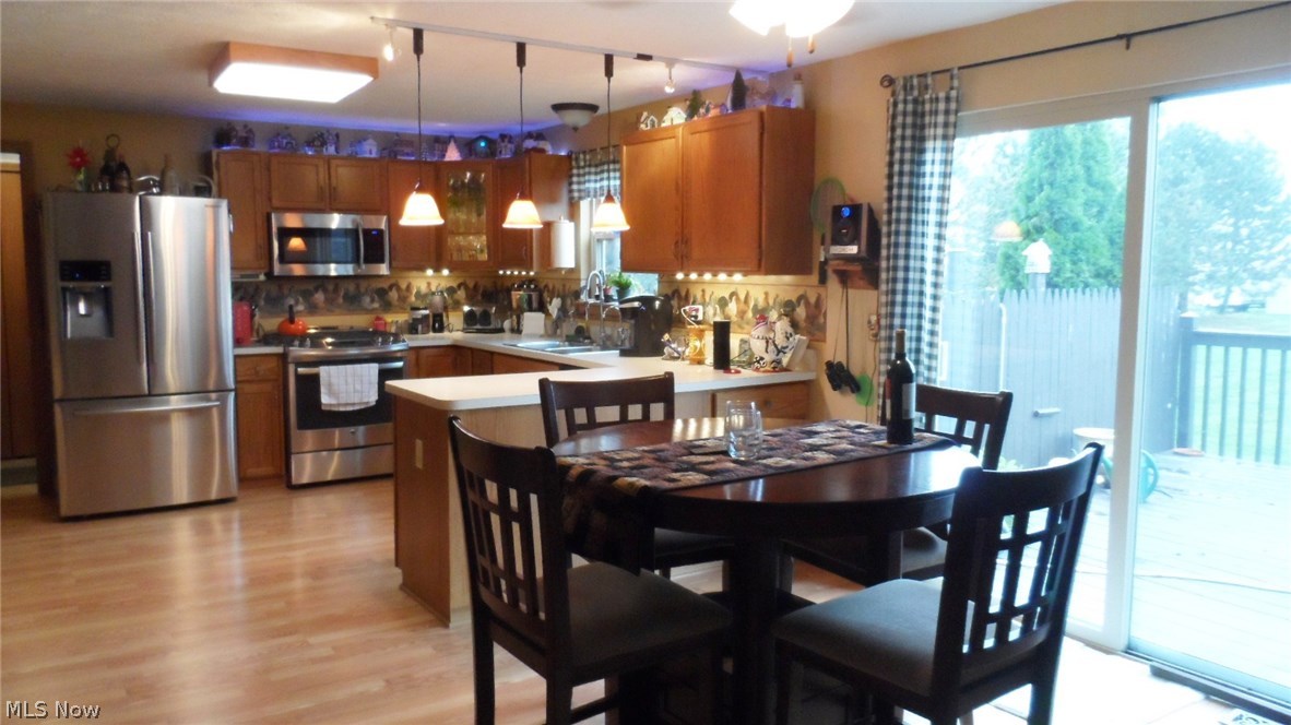 251 Eastern Road Doylestown, OH 44230 - Photo 35 of 35 OPEN FLOOR PLAN WITH DINING RM & SLIDING DOORS TO DECK & HOT TUB