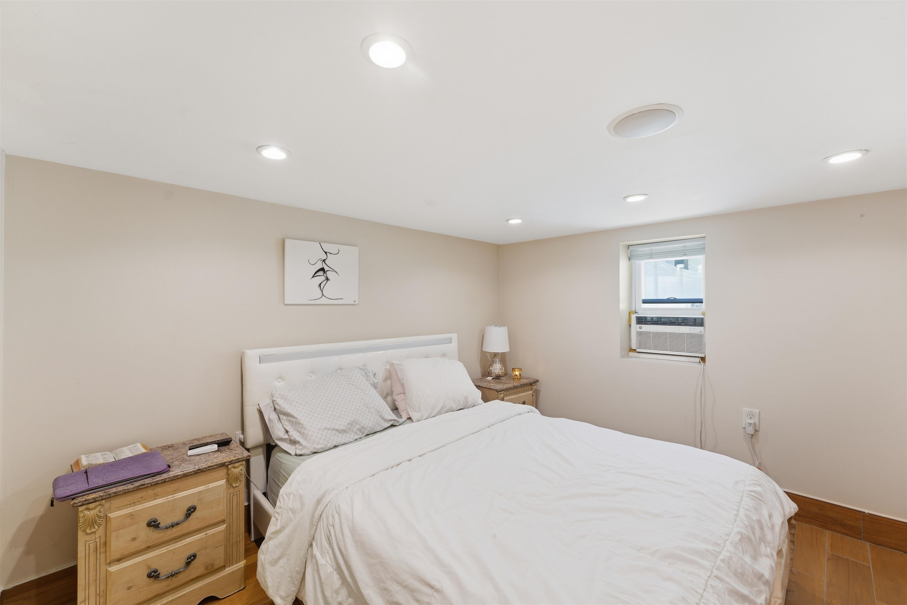 921 Paterson Plank Road North Bergen, NJ 07047 - Photo 13 of 50 a bedroom with a bed and a tv
