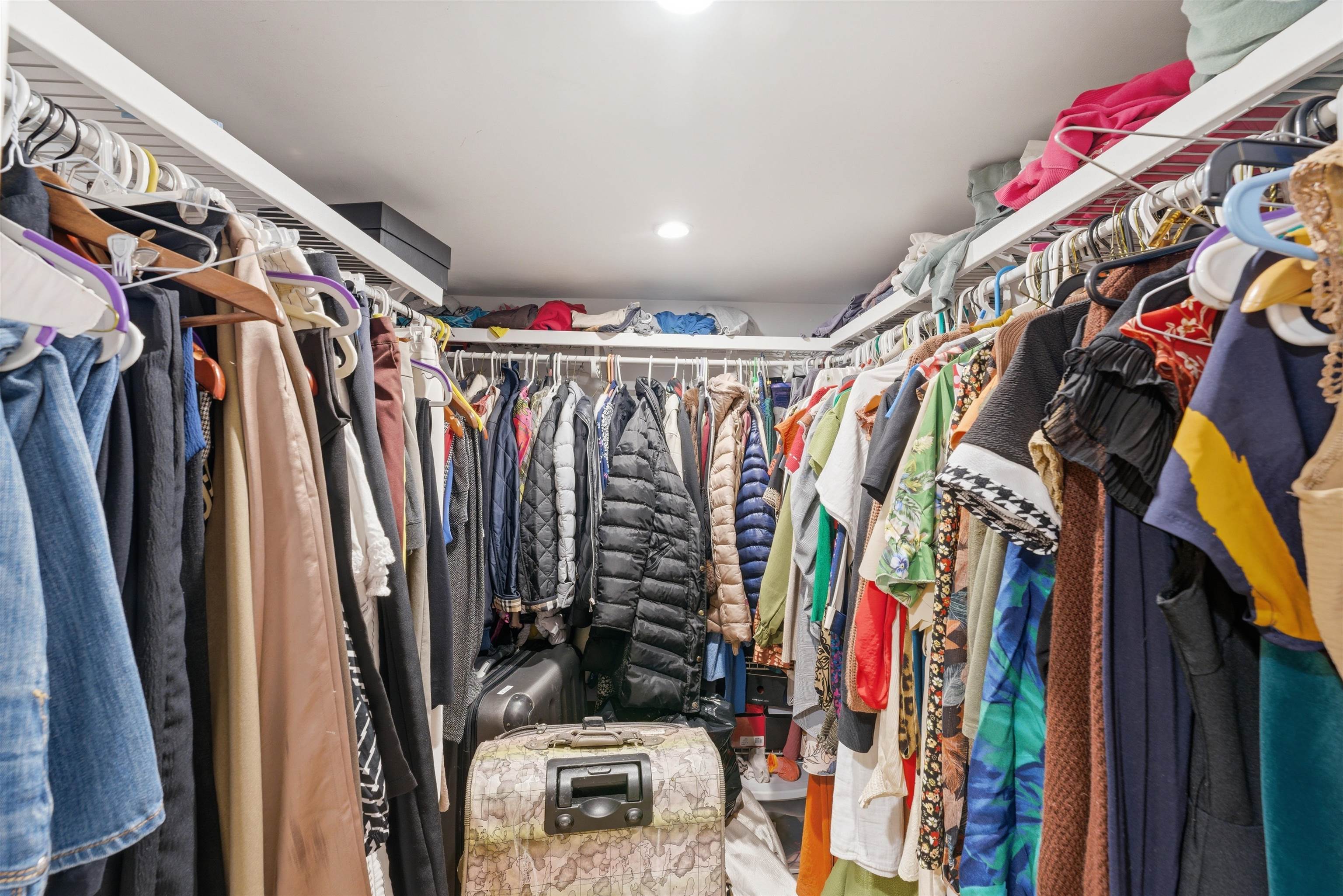 921 Paterson Plank Road North Bergen, NJ 07047 - Photo 15 of 50 a view of walk in closet with clothes